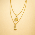 18K gold plated 2-layer chain with seashell and cowgirl shoe pendant