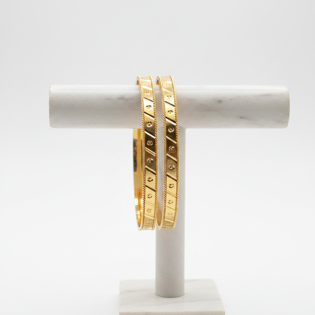 Engraved Gold Bangles on Stand