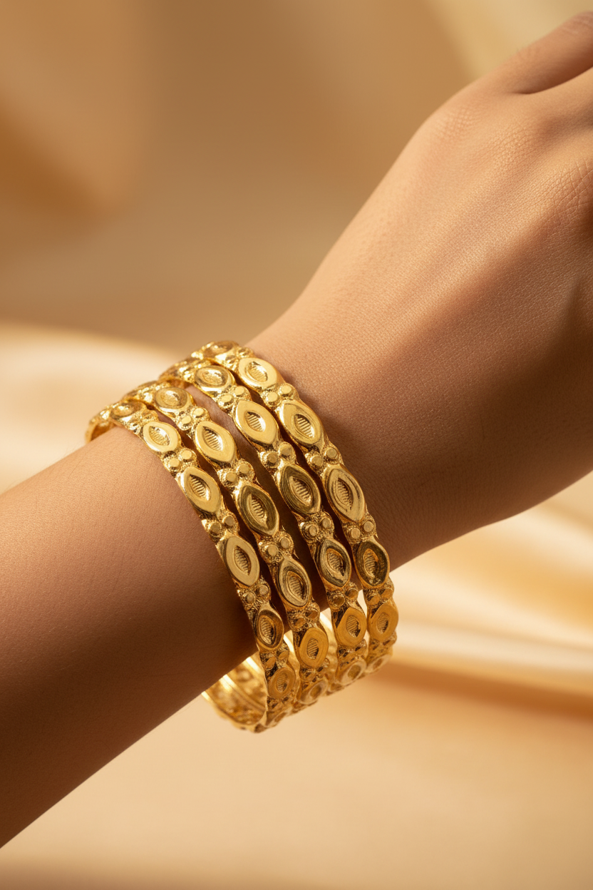 Girl Wearing Gold Oval Motif Bangles