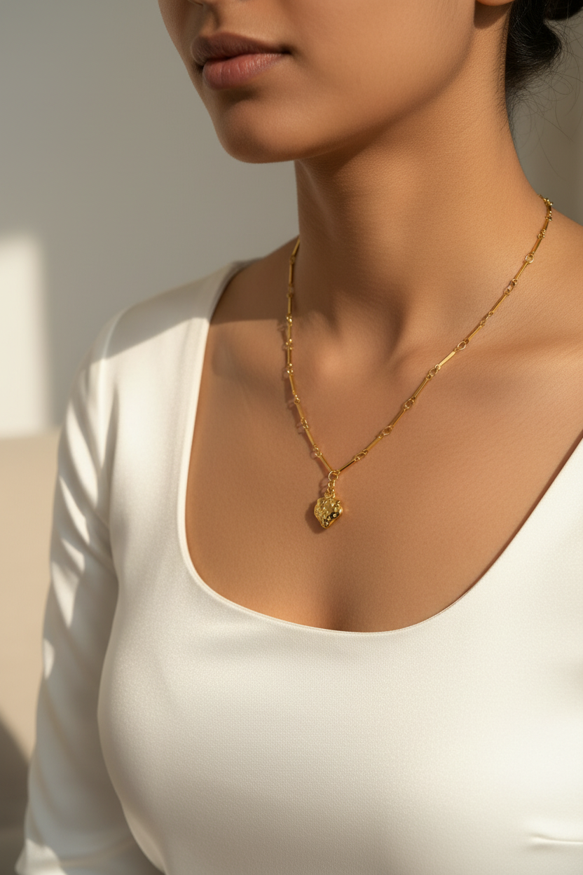 Girl Wearing Gold Strawberry Necklace