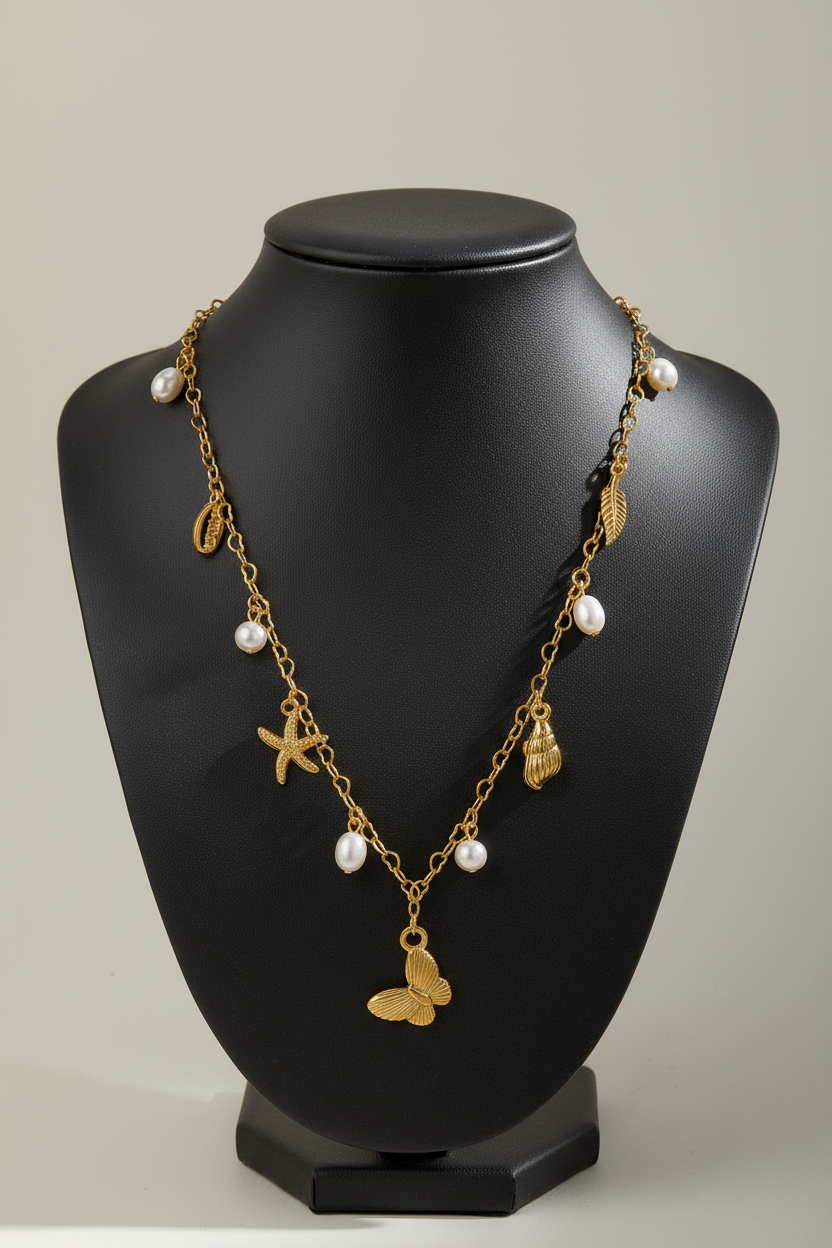 Gold Charm Necklace on Black Mannequin