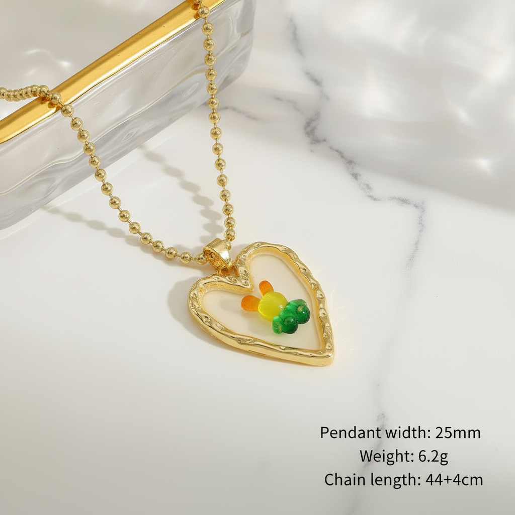 Gold heart pendant necklace showing 25mm size, 6.2g weight, 44+4cm chain length