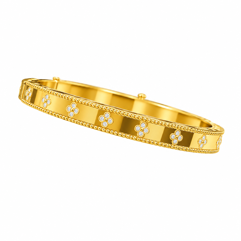 Gold plated jewellery on a clean white background