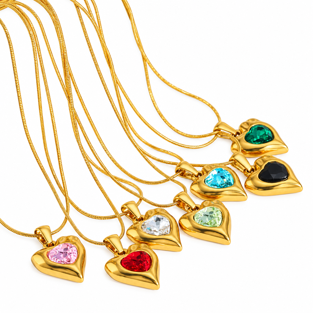 Gold plated jewellery on a clean white background