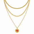 Gold plated jewellery on a clean white background
