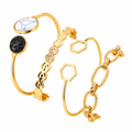 Enhanced gold plated jewellery on white background