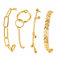 Gold plated jewellery on clean white background