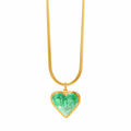 Gold plated jewellery on clean white background