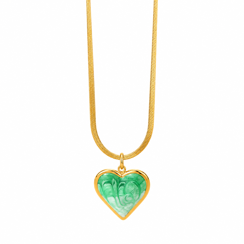 Gold plated jewellery on clean white background