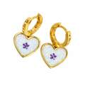 Gold plated jewellery on clean white background