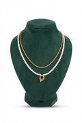 Necklace display with white background