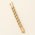 Website-ready gold-tone jewellery pair with green and pink accents
