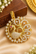 Micro gold plated dancing peacock pendant with white CZ fanned tail